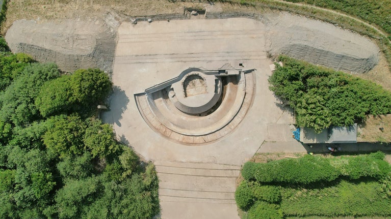 Aerial view of a Second World War concrete gun emplacement on a sunny day